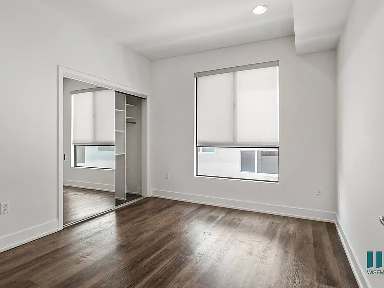 Bedroom with Vinyl Flooring, Recessed Lighting, and Window