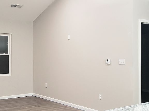 Large open concept with cathedral ceilings.