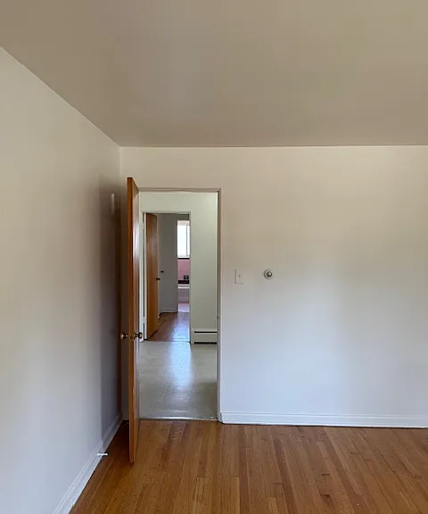 Entryway view through kitchen to the hallway and bathroom