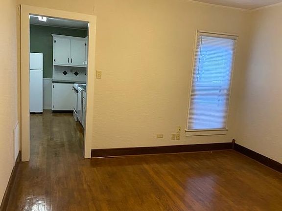 Living room looking into kitchen