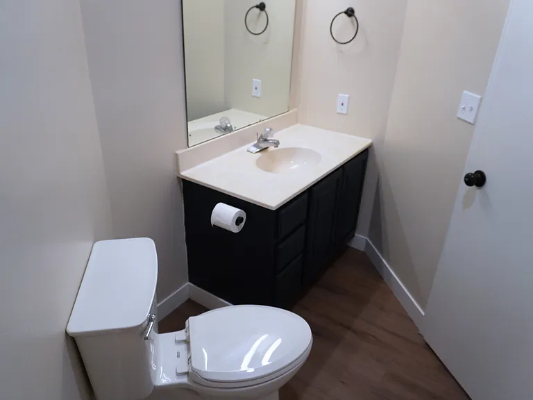 Hallway bathroom featuring a convenient tub/shower combination, perfect for relaxation and everyday use.