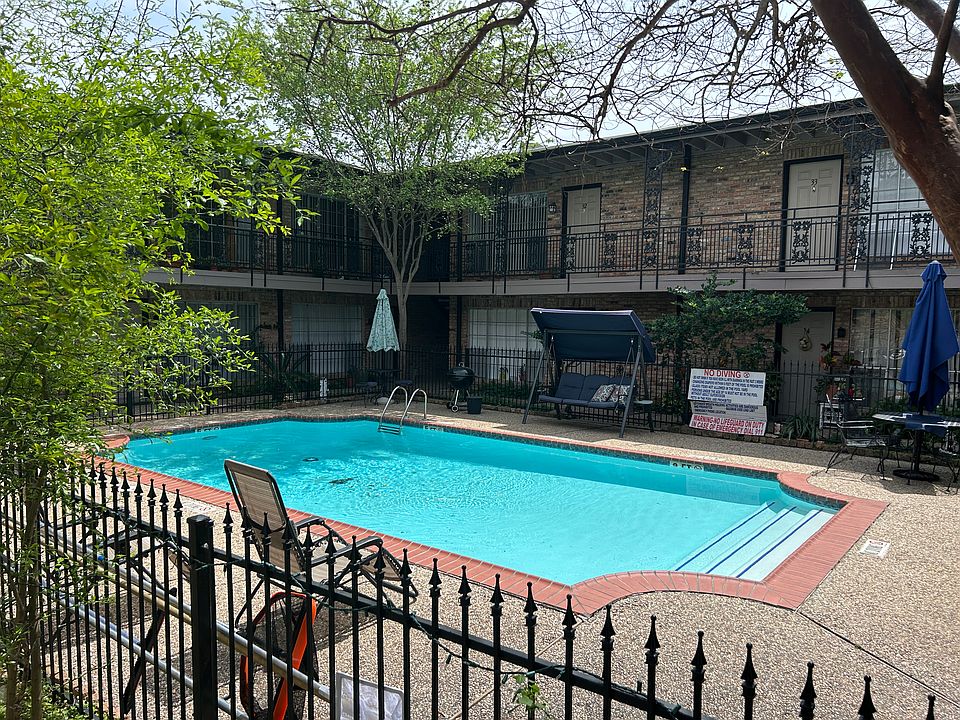 Pool surrounded by a fence.