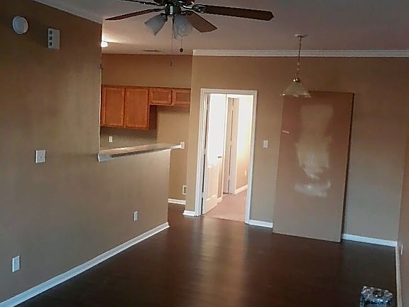 Main area looking toward dining, kitchen and master suite