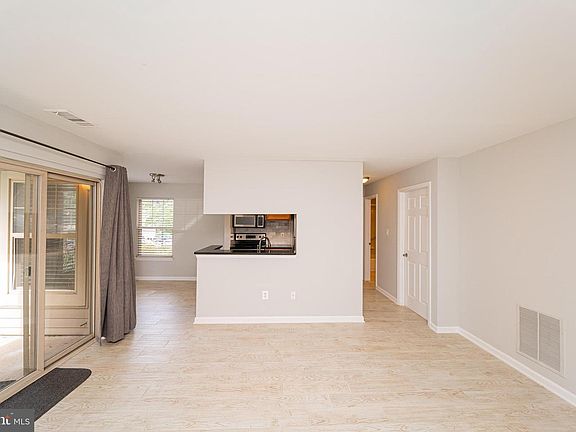 Living room facing kitchen