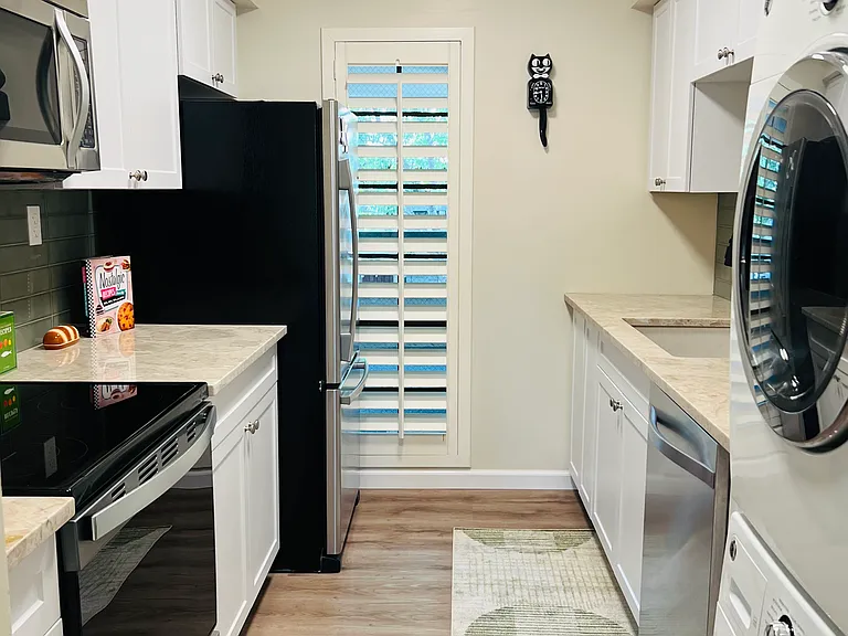 Kitchen has everything you'll need for basic cooking and baking