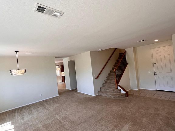 Front Door, Living Room and Upstairs