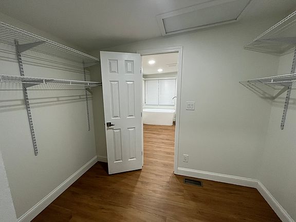 Master Bathroom features standalone tub, shower, double vanity, walk on closet and washer and dryer!