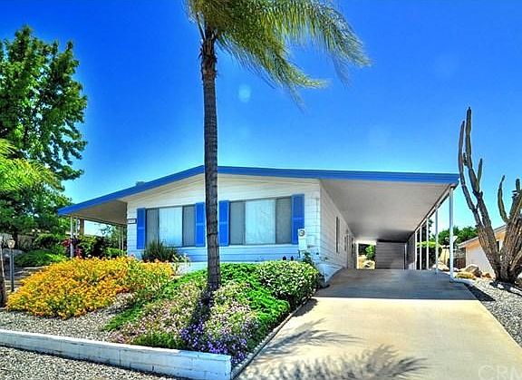 Carport has room for 3 cars