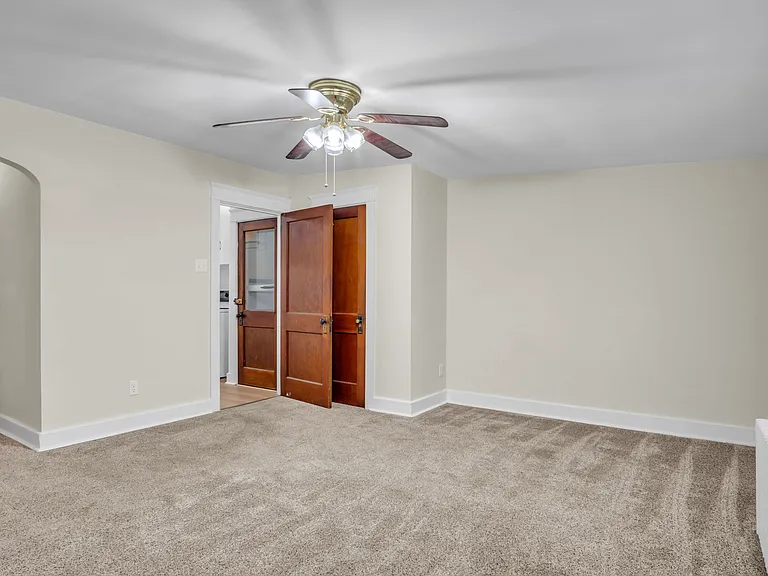 Bedroom 1 15.5'x14.5' in the rear