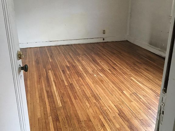 Hardwood floors in Master Bedroom.  Time to patch and paint 