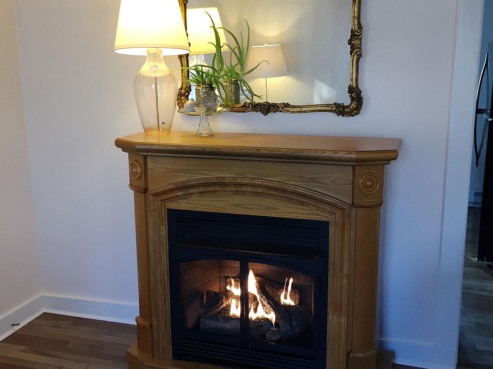 Propane fireplace located in living room