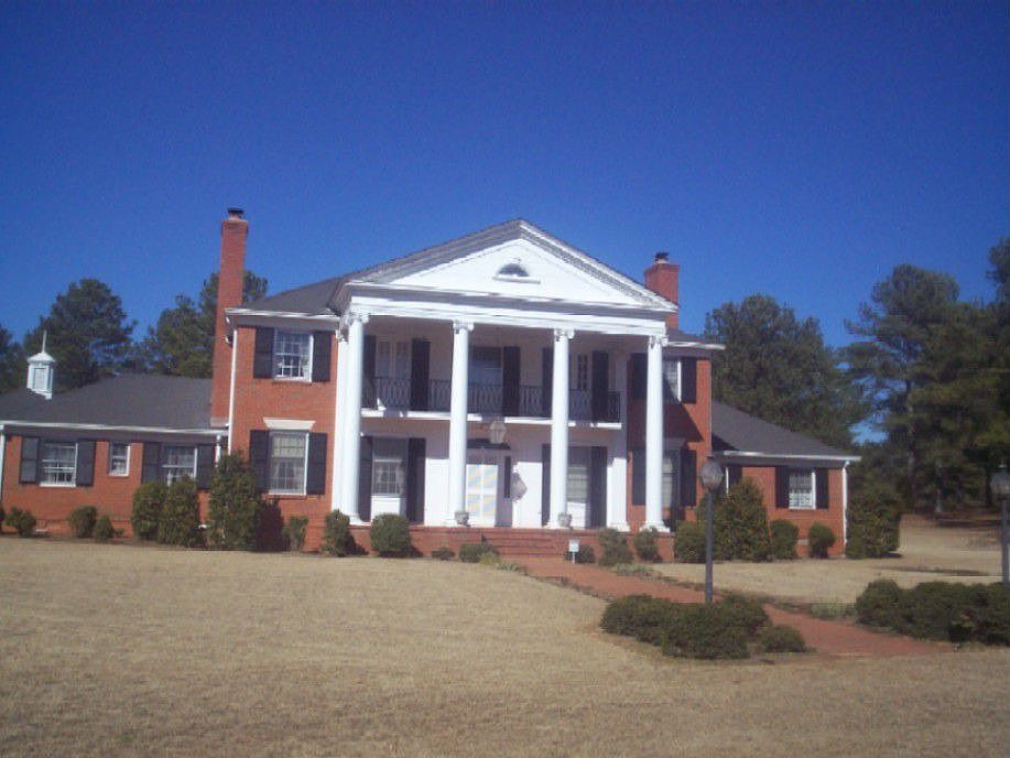 Magnificent 7000 sf Home + 36 Beautiful Landscaped Acres