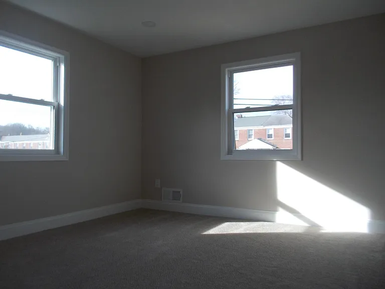 Living Room freshly painted with new carpet