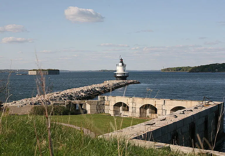 Fort Preble and Spring Point light with Fort Gorges and Casco Bay islands in the background