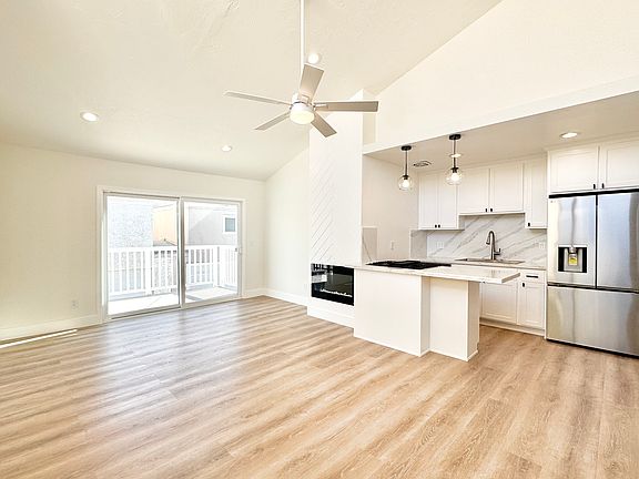 Beautiful open kitchen and living room with plenty of space and natural light!