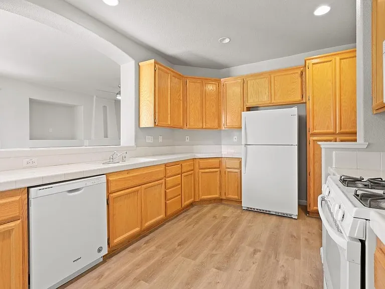 Kitchen with appliances and ample cabinets and counter space