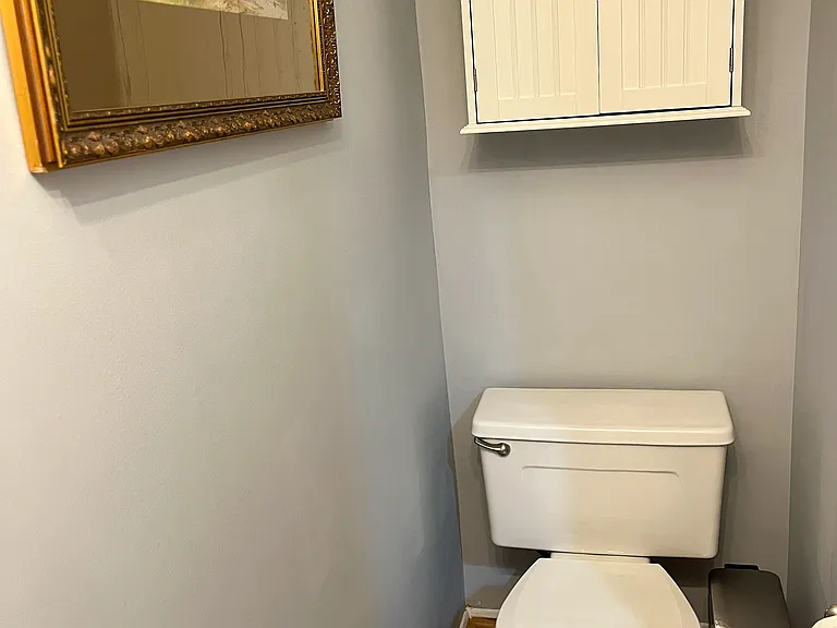 Half bathroom off entryway on 1st floor