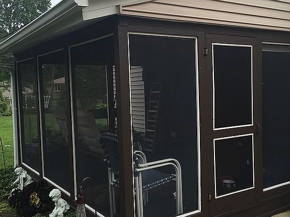 Attached screened in porch