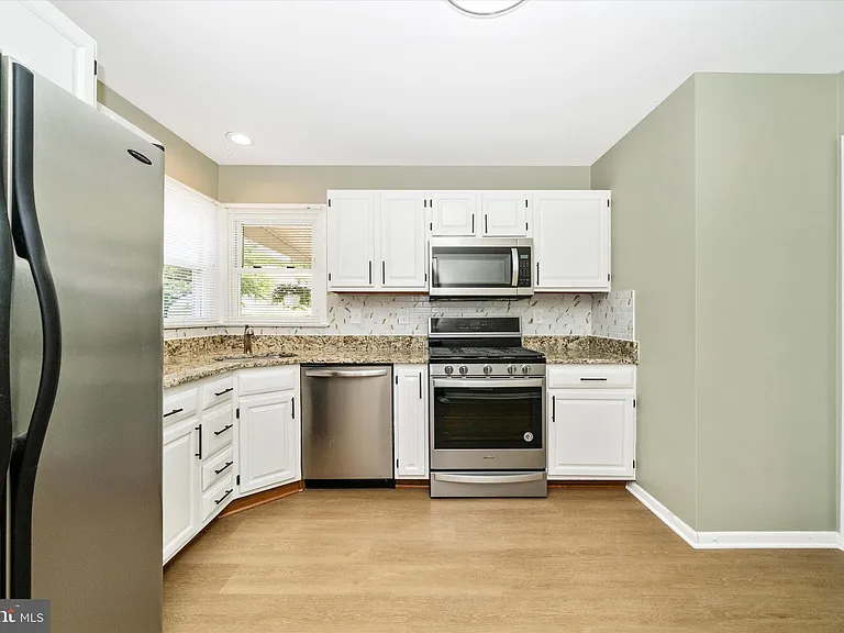 8409 Woodward St — Photo 10