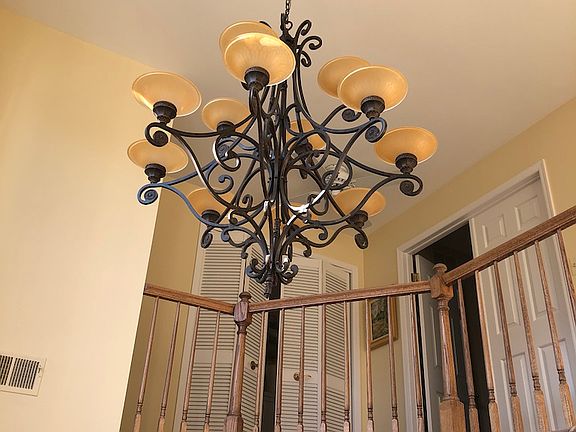 CHANDELIER IN CENTER HALLWAY