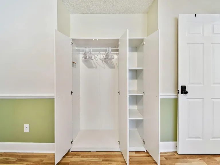 Armoire for hanging clothes and storage
