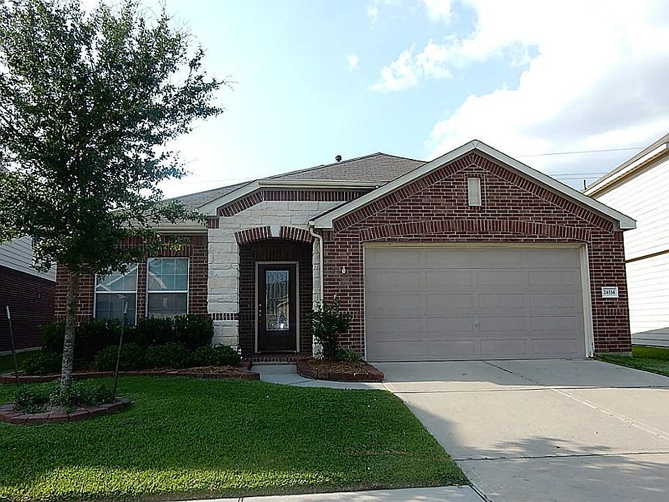 A charming elevation with stone and brick.