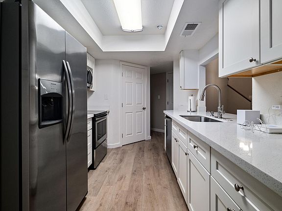Gorgeous Kitchen with all Stainless appliances and Vetrazzo countertop