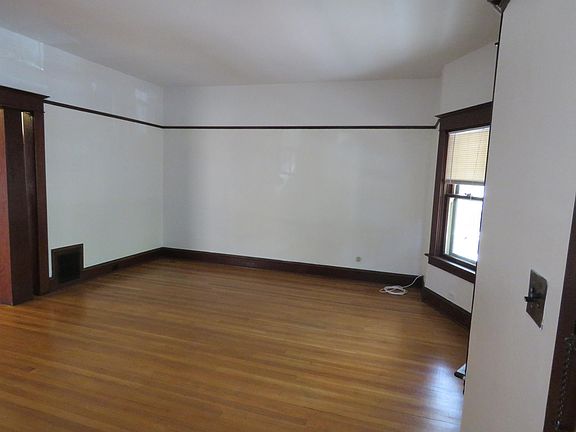 Living room and front bay windows.