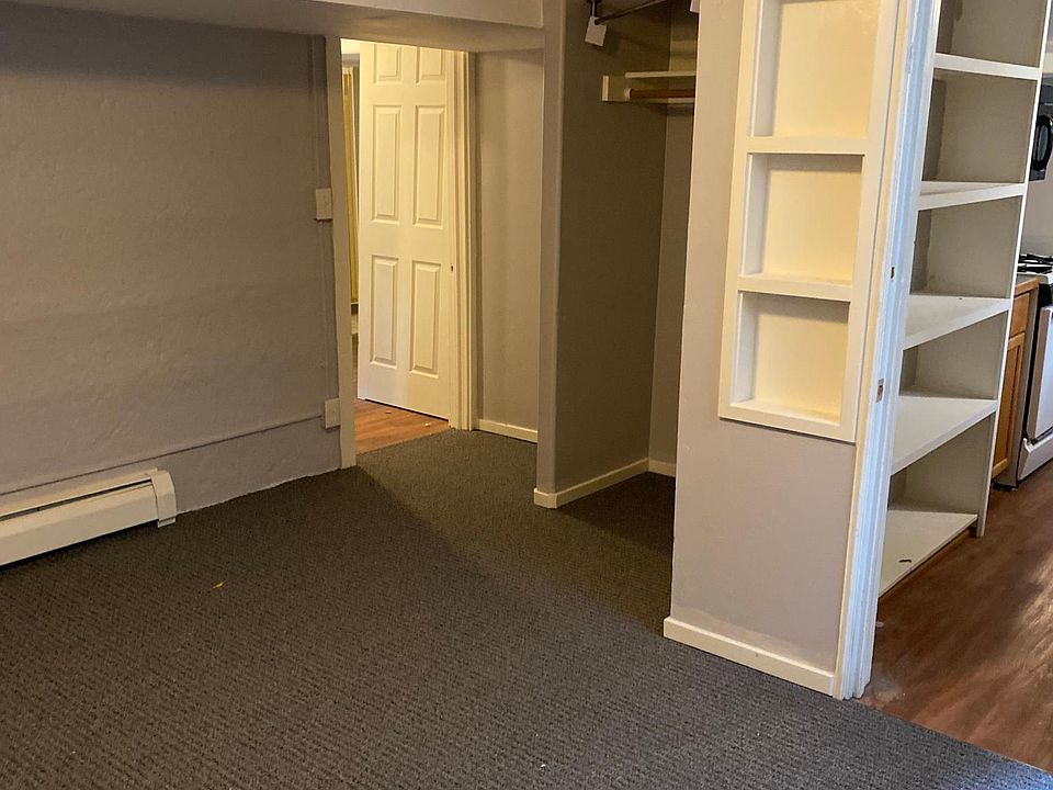 This north facing bedroom has cubby, closet, for storage, and bench seating area. The south facing bedroom has a larger closet, but no cubby area. Both are generous in size.