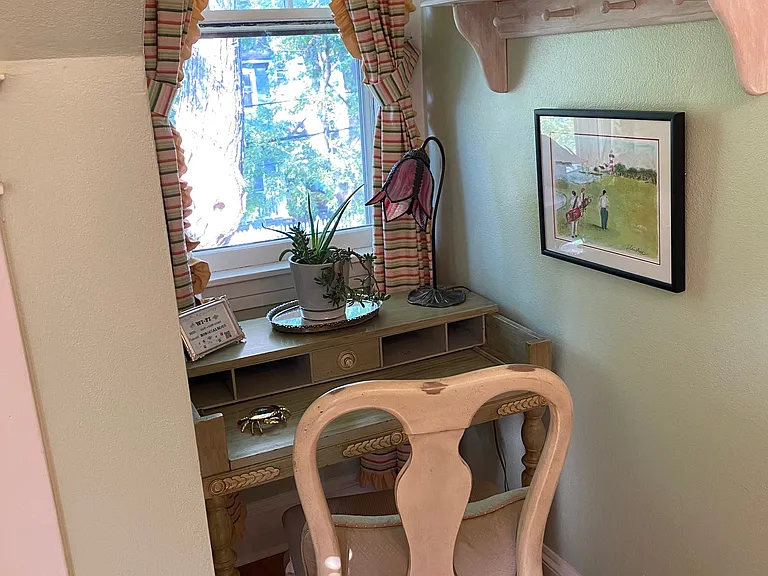 Third bedroom dormer window and work desk.