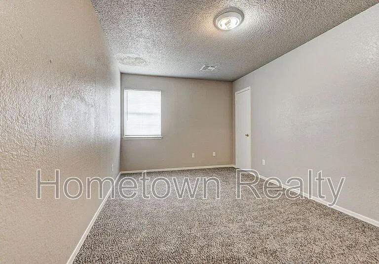 310 NW 118th St — Photo 38
