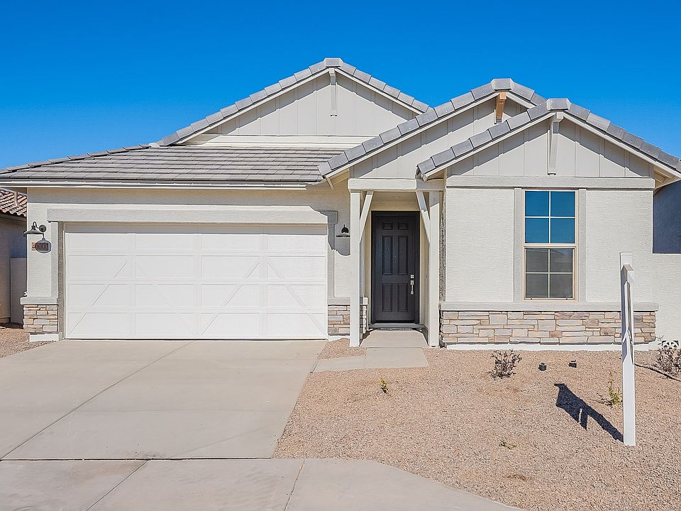 Embrace modern elegance with stone detailing and a sleek gable roof at The Lakes at Rancho El Dorado