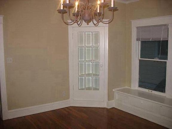 Dining room with Corner Cabinet, Beveled Leaded Glass