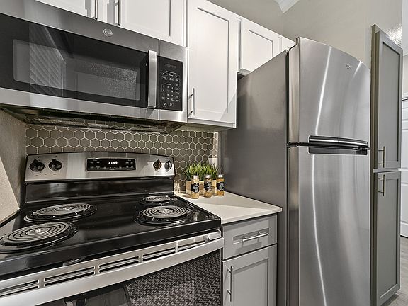 2nd image of 9637 Forest Ln #437