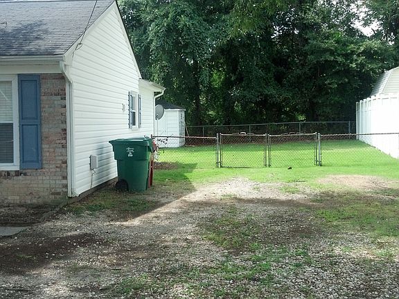 Side View Fenced in Back Yard