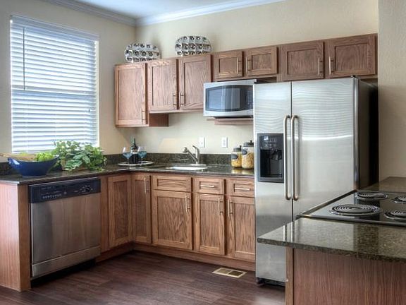 Kitchen, w/ granite & stainless (model shown)