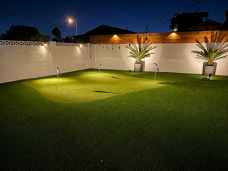 large putting green with 3 pins, light up at night for anytime putt-putt day or night.