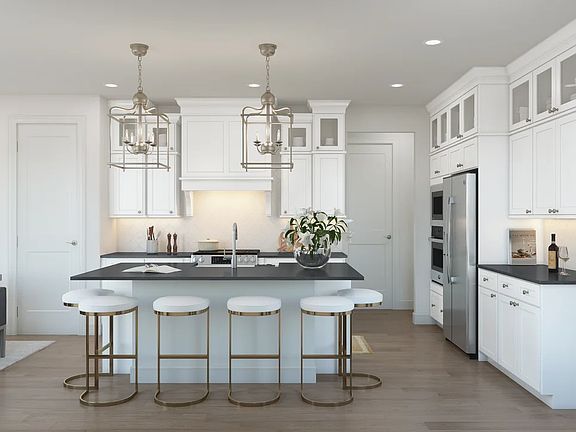 Kitchen with upper glass cabinets vast island