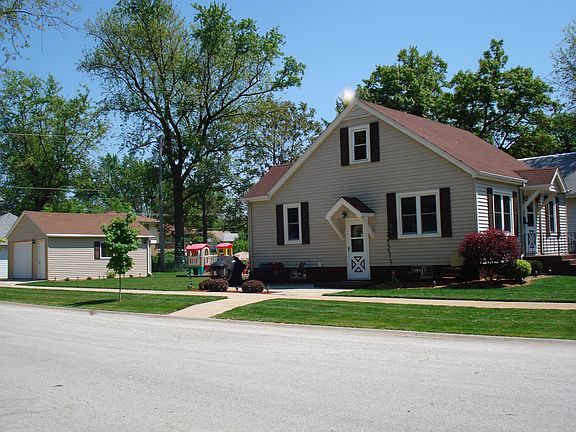 Yard view w/remodeled garage