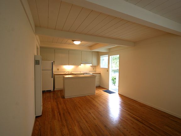 Looking towards the kitchen from the far end of the living room