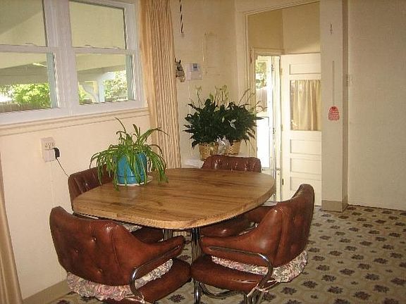 Dining Area leads with entry to Back Porch!