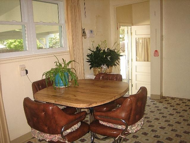 Dining Area leads with entry to Back Porch!