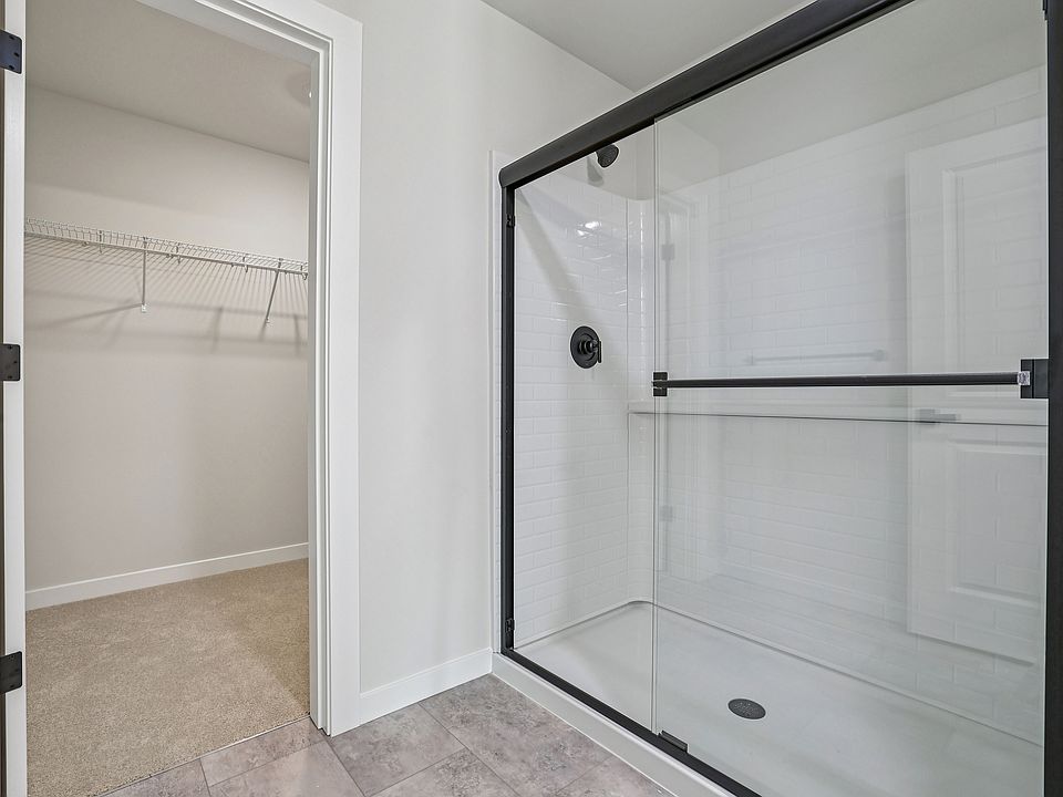 Primary bathroom with walk-in closet