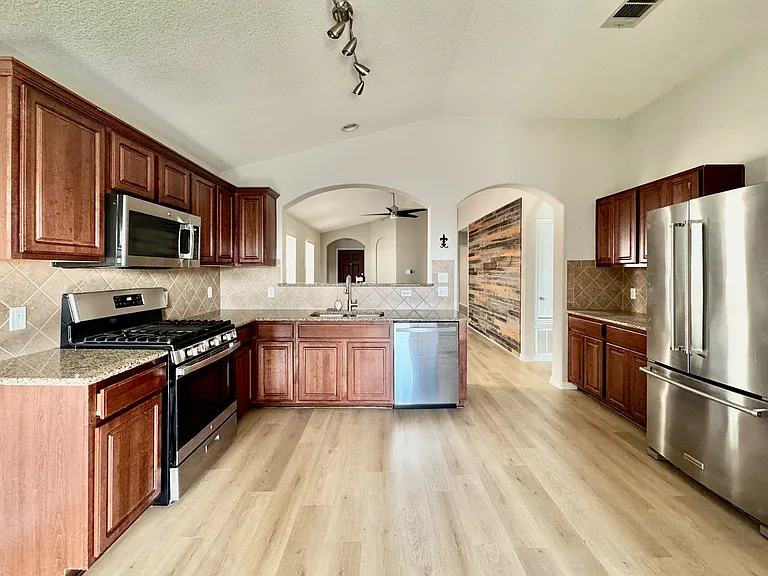 Kitchen - Gas Stove/Oven, Microwave, Dishwasher and fridge