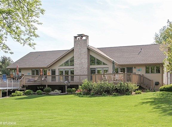 Striking architectural windows and spacious deck for entertaining!