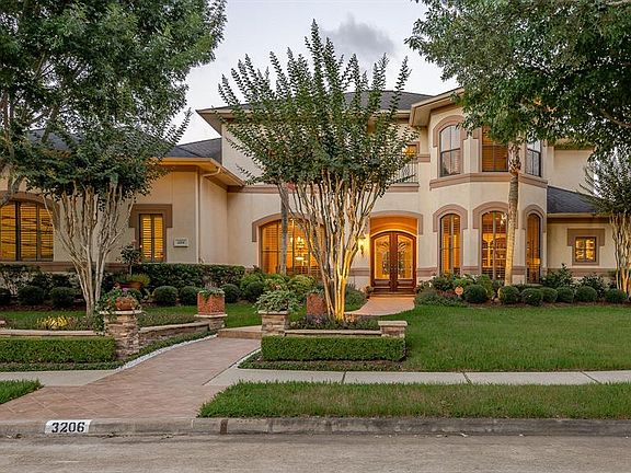 WELCOME TO 3206 ACORN WOOD WAY, A BEAUTIFUL MASTERPIECE CUSTOM HOME IDEALLY LOCATED ON ONE OF BAY OAKS MOST SOUGHT AFTER STREETS WITH MAGNIFICENT ESTATES. BAY OAKS COUNTRY CLUB AND GOLF COURSE IS ALSO CONVENIENTLY LOCATED JUST 3 BLOCKS AWAY. YOU WON'