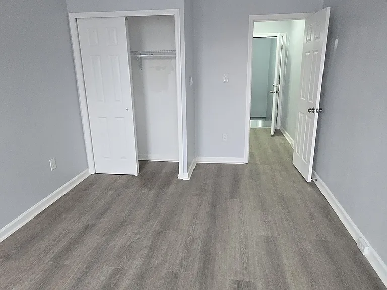 back bedroom (closet view)