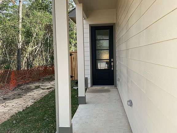 Front Door (private) with green space on the side
