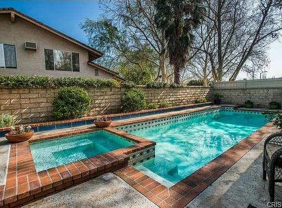 Backyard with Private Designer Pool and Spa.