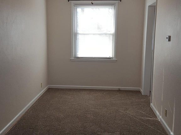 Dining area with entry to kitchen